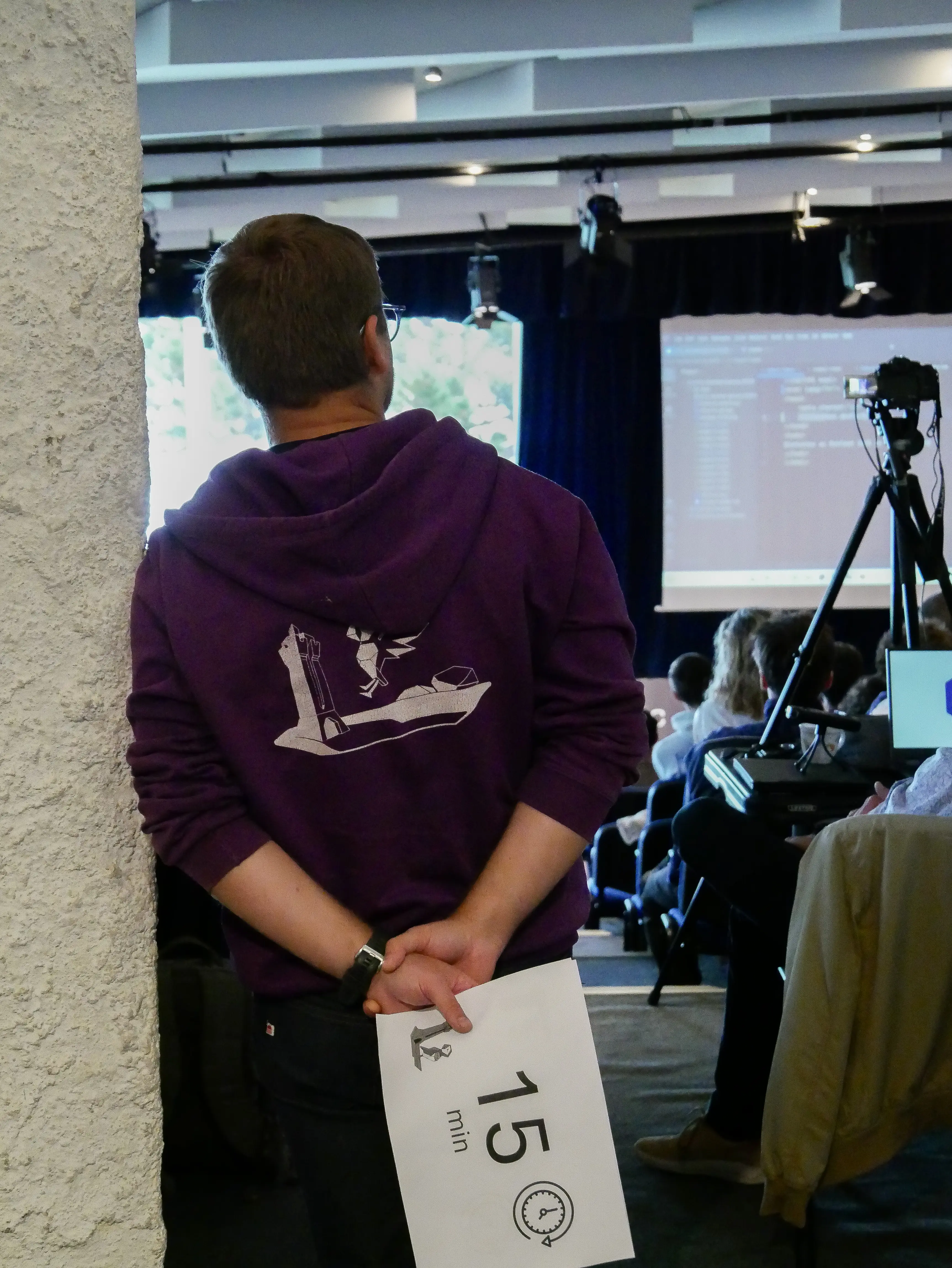 Event staff member holding a 